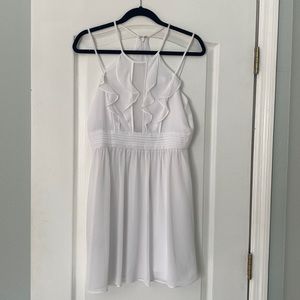 Pure white BCBG mini dress perfect for the bride to be! Only worn once !